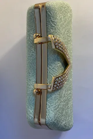 Bolso de fiesta verde y dorado