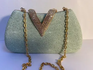 Bolso de fiesta verde y dorado