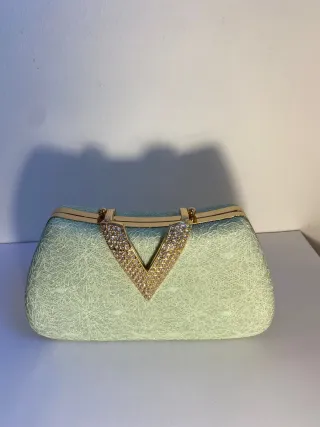 Bolso de fiesta verde y dorado