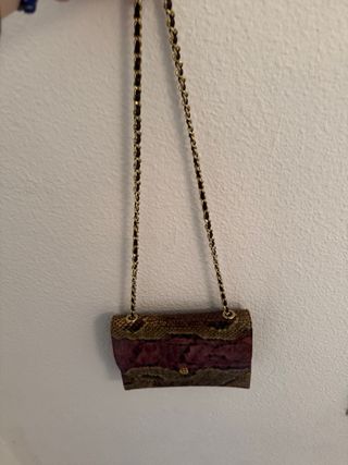 Bolso piel cadena estampado serpiente