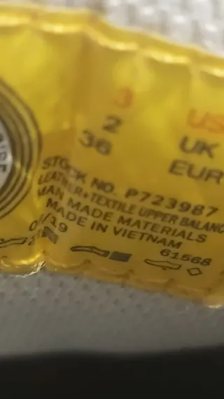 Zapatillas CAT niña blancas y amarillas