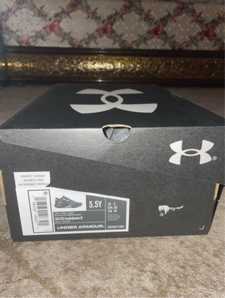Scarpe Under Armour nere e oro