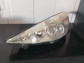Faro Peugeot 206 Izquierdo.