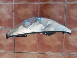 Faro Peugeot 206 Izquierdo.