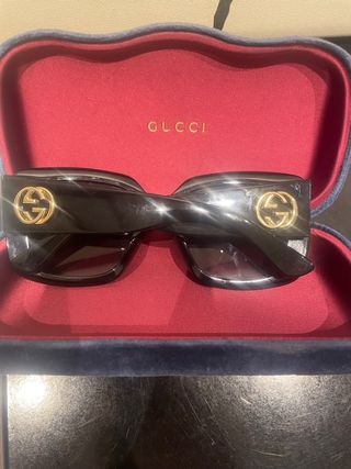 Occhiali da sole Gucci neri e oro