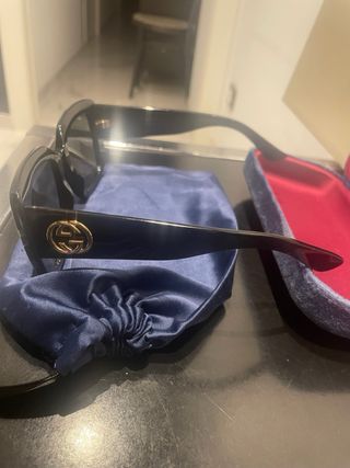 Occhiali da sole Gucci neri e oro