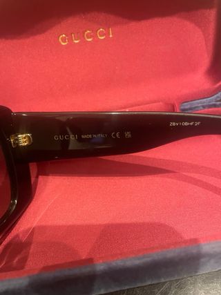 Occhiali da sole Gucci neri e oro