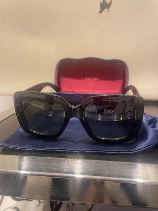 Occhiali da sole Gucci neri e oro