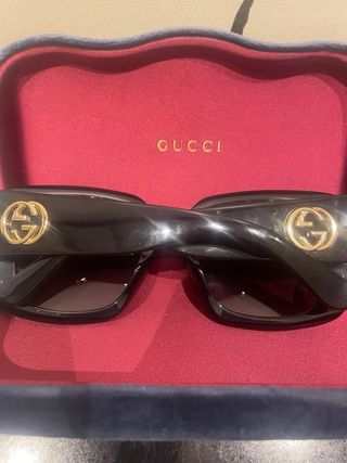Occhiali da sole Gucci neri e oro
