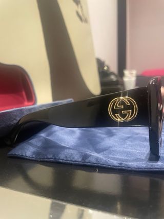 Occhiali da sole Gucci neri e oro