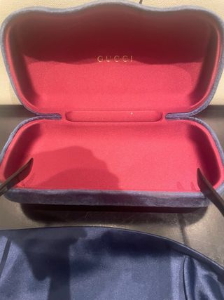 Occhiali da sole Gucci neri e oro