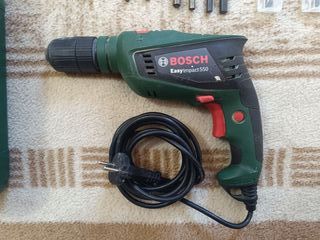 Taladro Bosch 550W con maletín y brocas