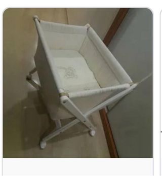 Minicuna blanca con peluche