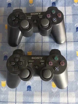 2 Mandos PS3 Sony Nuevos más soporte para mandos