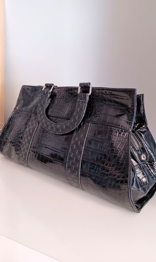 Elegante bolso de Adolfo Domínguez. IMPECABLE