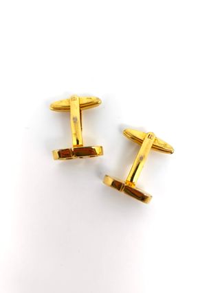 Gemelos Christian Dior chapados en oro vintage