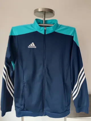 Chaqueta vintage Adidas azul marino y turquesa.