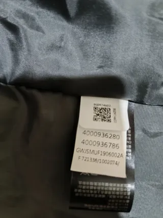 Chaqueta The North Face Negra y Azul Marino