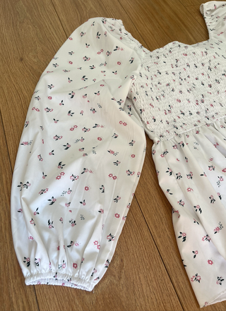 Camiseta blanca flores manga larga