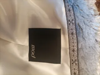 Abrigo pelo plateado