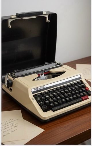 Máquina de escribir Punto Azul