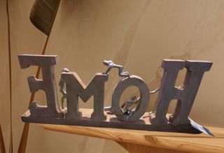 Escultura HOME Madera y Metal familia