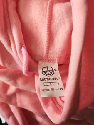 Sudadera rosa con diseño árabe