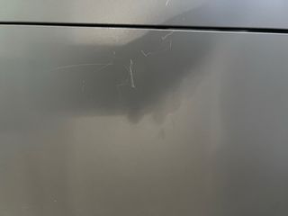 Mueble de baño IKEA gris oscuro.