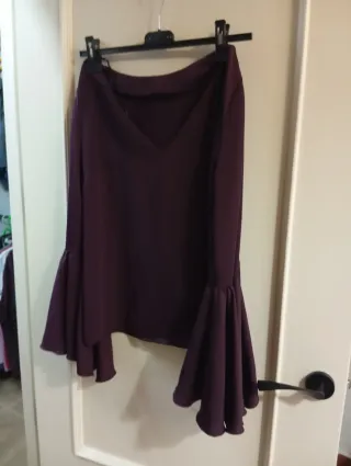 Blusa morada con mangas acampanadas
