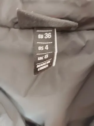 Plumas Ellesse negro