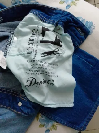 Jeans strappati blu uomo