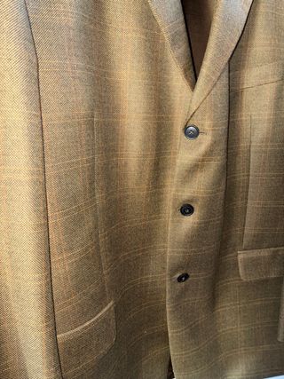 Americana de cuadros marrón y naranja