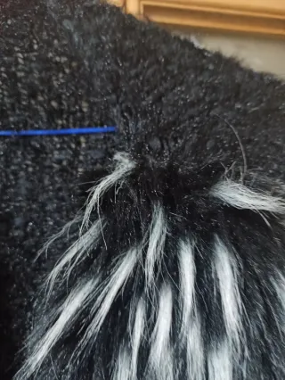 Chaqueta fiesta negra y blanca con pelo