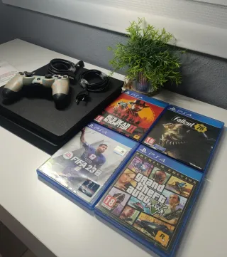 PS4 + 4 Juegos + mando de regalo .