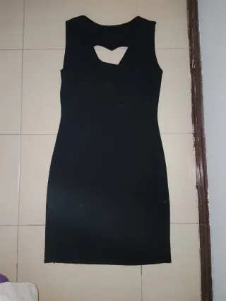 Vestido brillos ,En la espalda tiene un corazón