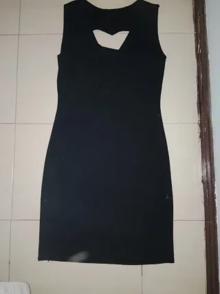 Vestido brillos ,En la espalda tiene un corazón