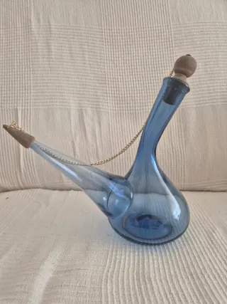 Porrones antiguos de vidrio con más de 90 años.