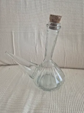 Porrones antiguos de vidrio con más de 90 años.