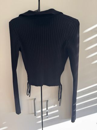 Jersey aberturas laterales negro