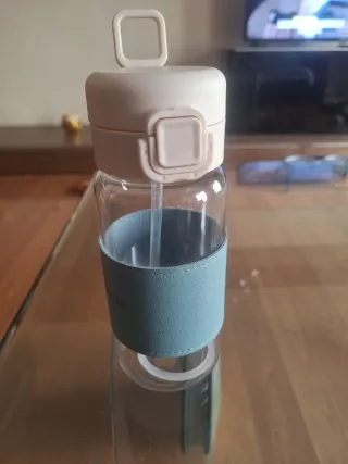 Vaso de vidrio con funda