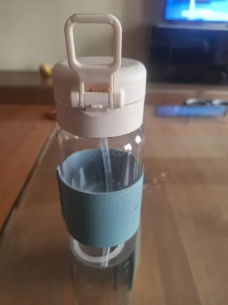 Vaso de vidrio con funda