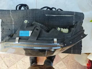 Faro delantero coche mitsubishi space star dl izq