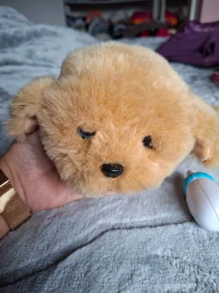 Perrito interactivo con biberón