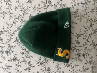 Gorro Supreme New Era verde y dorado