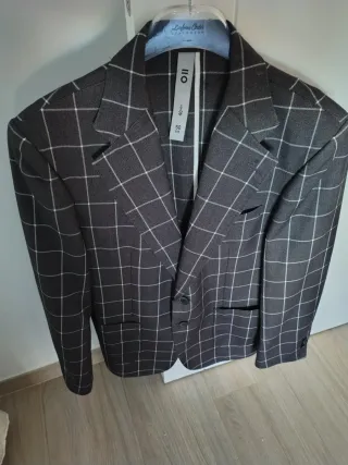 Chaqueta de vestir cuadros gris y líneas blancas
