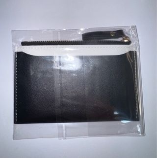 Monedero negro y blanco