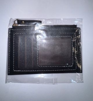 Monedero negro y blanco