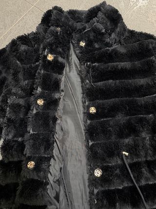 Pelliccia donna nera