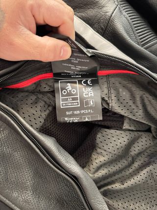 Mono de moto Dainese negro y blanco