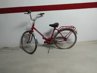 Bicicleta plegable roja vintage